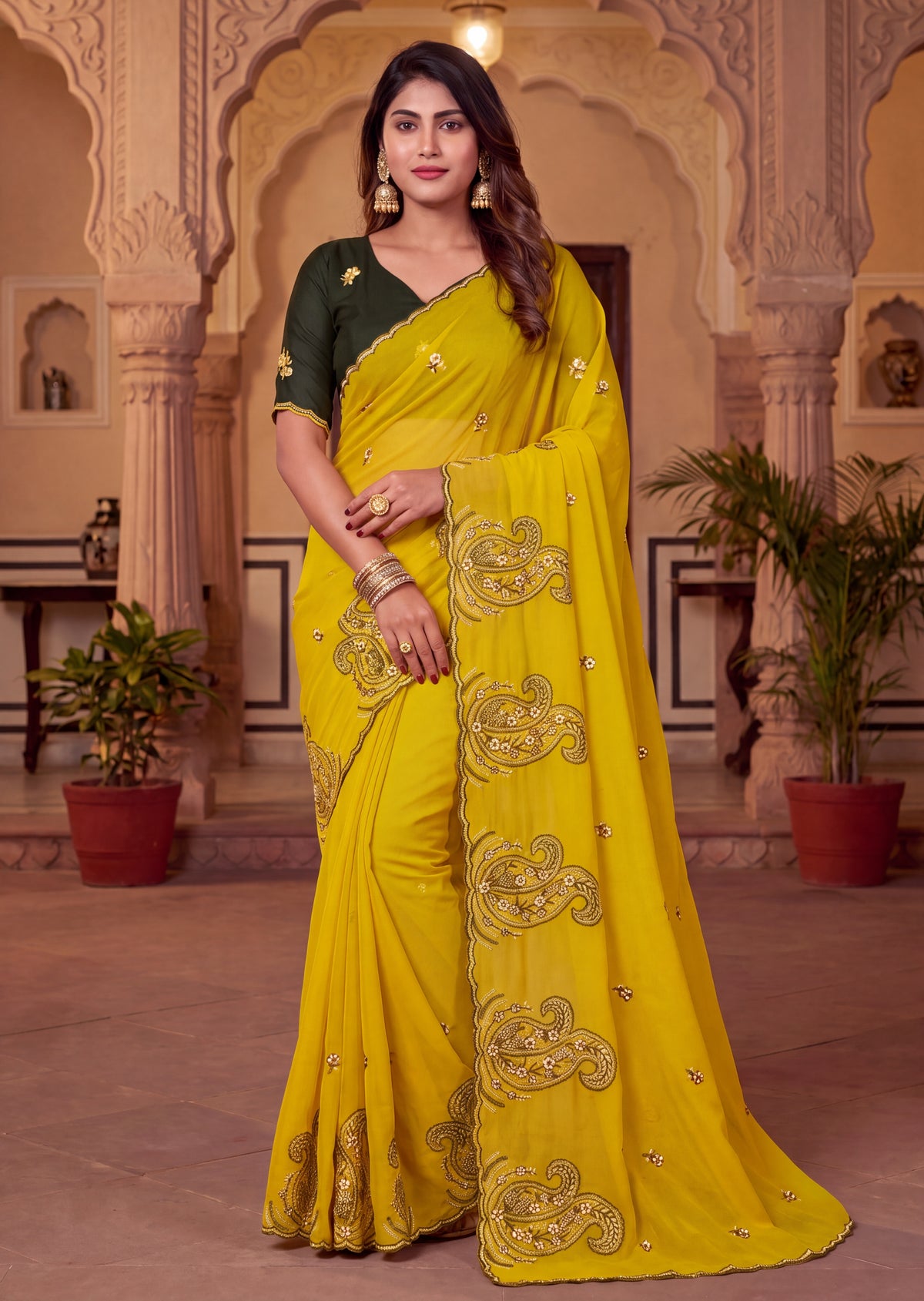 Festive Paisley Embroidered Georgette Saree