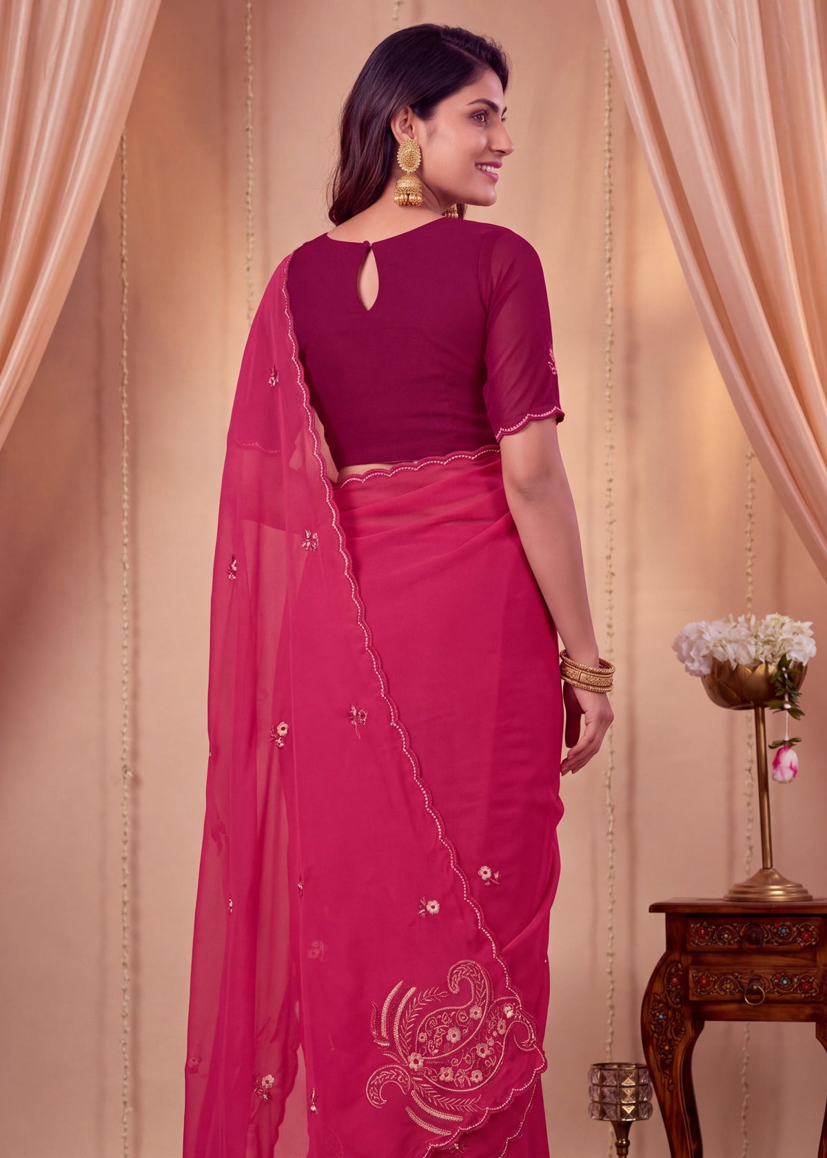 Festive Paisley Embroidered Georgette Saree