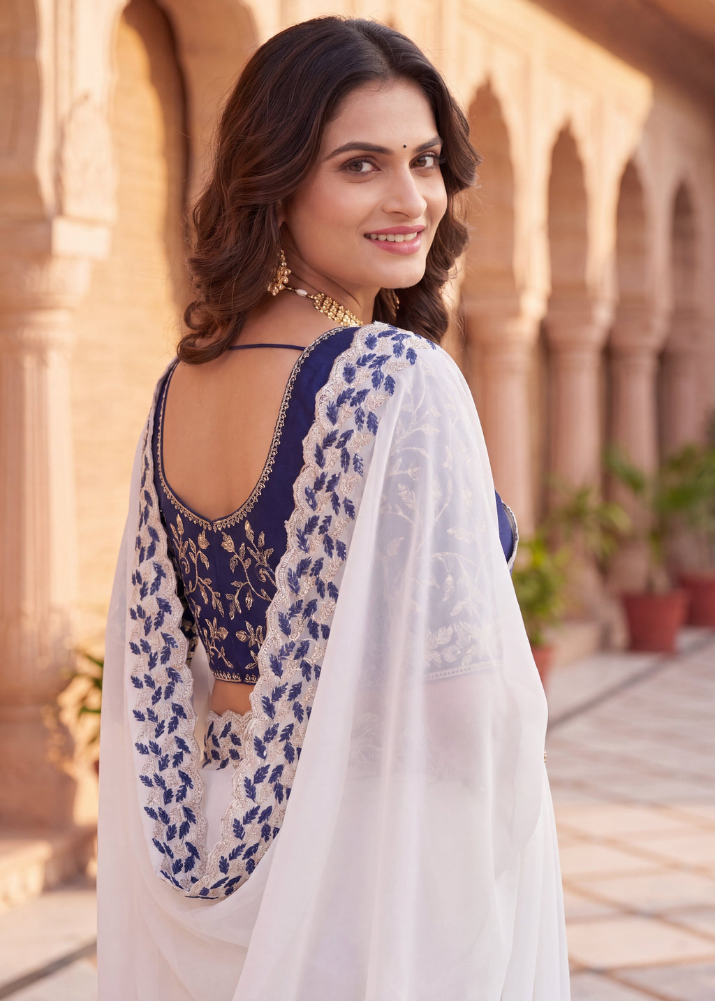 Festive Embroidered Shimmer Georgette Designer Saree