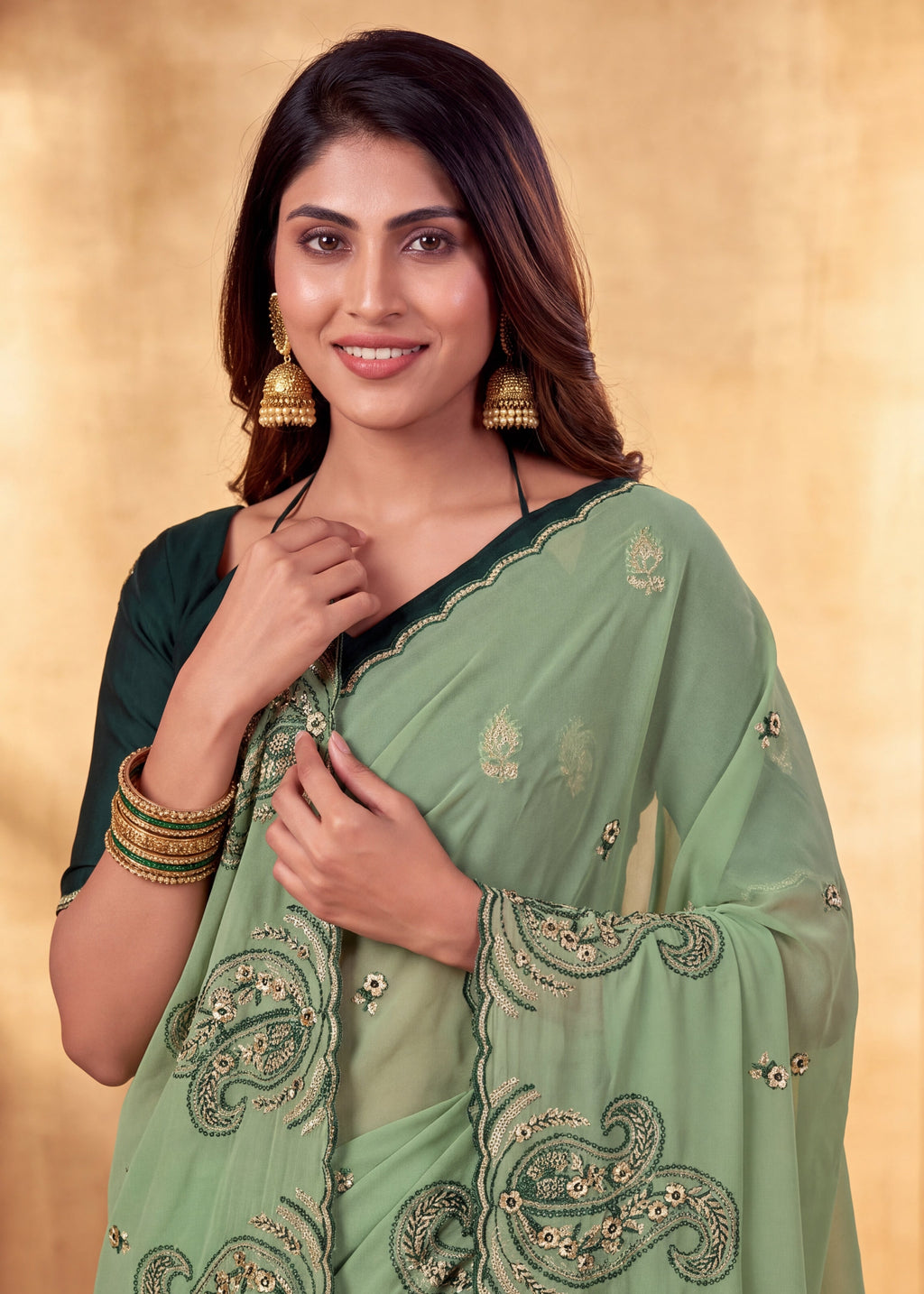 Festive Paisley Embroidered Georgette Saree